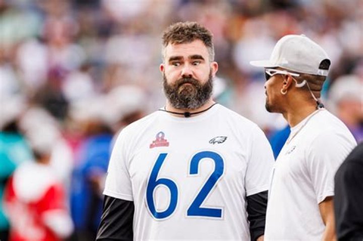 Jason Kelce #62 (L) and Jalen Hurts #1 of the Philadelphia Eagles and NFC talk during the 2024 NFL Pro Bowl at Camping World Stadium on February 04...